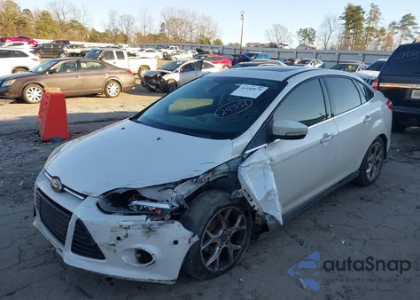 2012 Ford Focus Titanium z USA, uszkodzony, nr VIN 1FAHP3J20CL428059